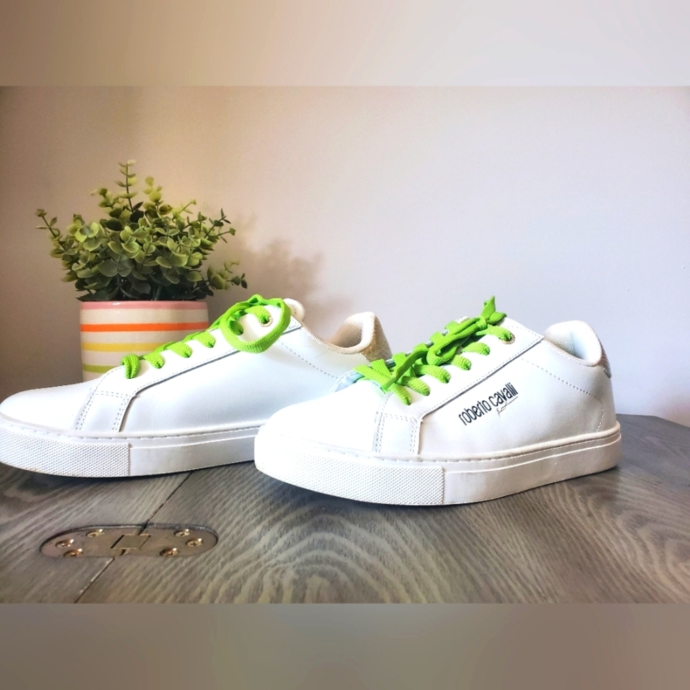 Roberto Cavalli white leather sneakers with green laces and gold backs. Size 8